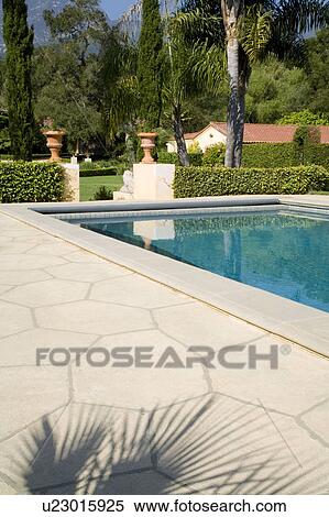 Swimming pool with stone deck View Large Photo Image Stock Photography - Swimming pool with stone deck. Fotosearch