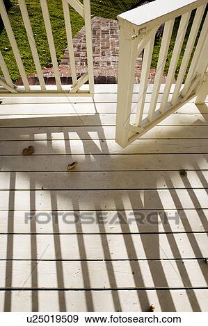 Stock Photo - Traditional White Porch Gate. Fotosearch