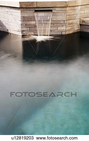 Waterfall from Stone Jacuzzi to Swimming Pool View Large Photo Image Stock Image - Waterfall from Stone Jacuzzi to Swimming Pool. Fotosearch
