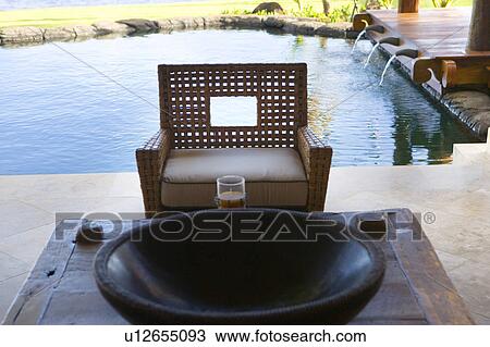 Whicker Armchair and Table View Large Photo Image Stock Image - Whicker Armchair and Table. Fotosearch