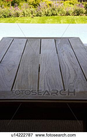 Wood deck overlooking swimming pool View Large Photo Image Stock Photo - Wood deck overlooking swimming pool. Fotosearch