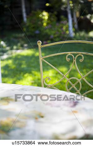 Wrought Iron Outdoor Dining Table And Chairs Picture U15733864 Fotosearch