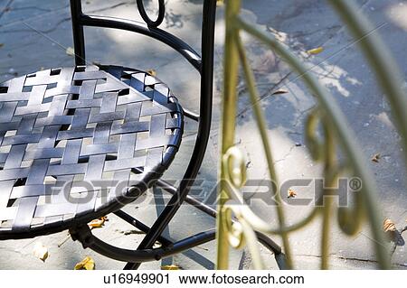 Wrought iron outdoor dining table and chairs View Large Photo Image Stock Image - Wrought iron outdoor dining table and chairs. Fotosearch