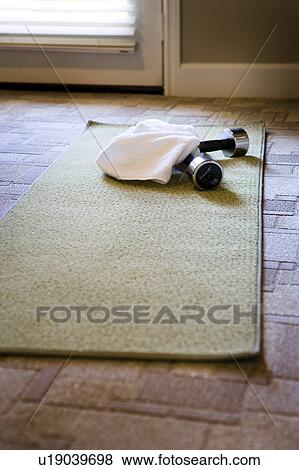 Yoga Mat and Free Weights on Carpet View Large Photo Image Stock Photo - Yoga Mat and Free Weights on Carpet. Fotosearch