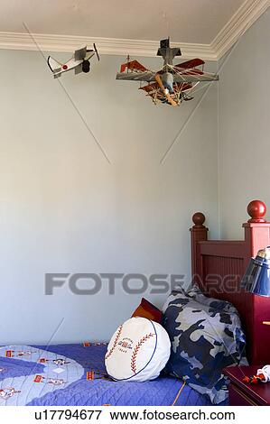 Picture Of Young Boys Room With Hanging Airplanes U17794677 Search Picture Young Boys Room With Hanging Airplanes Fotosearch Search Stock Photography Photos