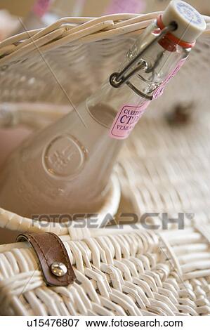 Bottle of pink lemonade in picnic basket View Large Photo Image Stock Photo - Bottle of pink lemonade in picnic basket. Fotosearch