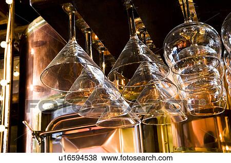 Ceiling Mounted Display for Martini and Wine Glasses View Large Photo Image Stock Photo - Ceiling Mounted Display for Martini and Wine Glasses. Fotosearch