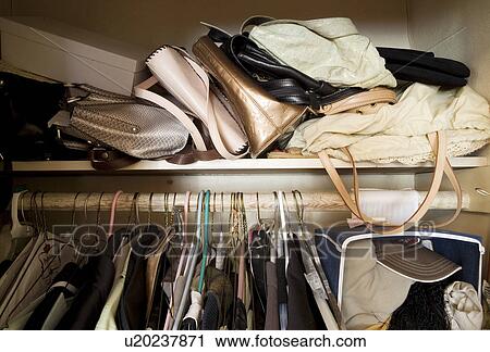 Detail of packed closet. View Large Photo Image Stock Image - Detail of packed closet.. Fotosearch