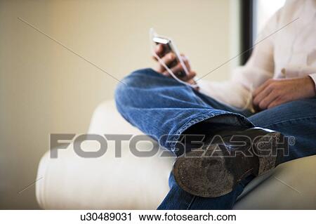 Man Listening to MP3 Player View Large Photo Image Stock Image - Man Listening to MP3 Player. Fotosearch