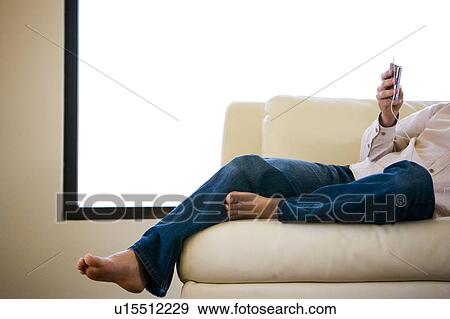 Man Listening to MP3 Player View Large Photo Image Stock Photo - Man Listening to MP3 Player. Fotosearch
