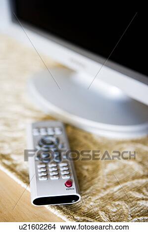 Picture - Remote and television. Fotosearch