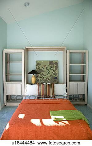 Bright Orange Bed and Shelving View Large Photo Image Picture - Bright Orange Bed and Shelving. Fotosearch