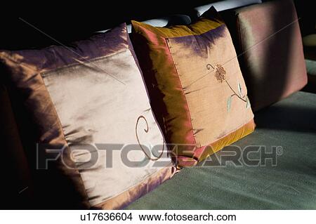Contemporary Pillows on Green Cushion View Large Photo Image Picture - Contemporary Pillows on Green Cushion. Fotosearch