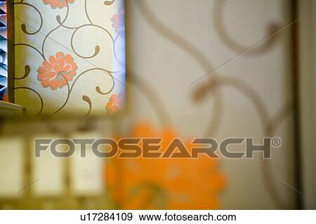 Stock Photo - Detail of retro style wallpaper in reflection of mirror.. Fotosearch