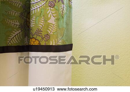 Stock Image - Green and white contemporary curtain . Fotosearch