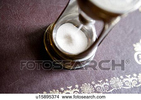 Old Fashioned Brass Hourglass View Large Photo Image Picture - Old Fashioned Brass Hourglass. Fotosearch