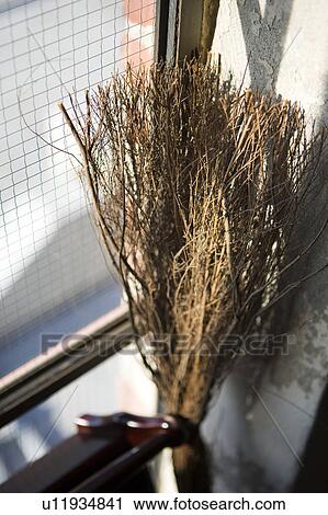 Detail of brush next to window View Large Photo Image Stock Image - Detail of brush next to window. Fotosearch