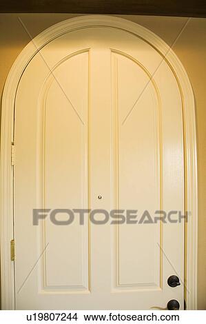 Picture - Arched Front Door. Fotosearch