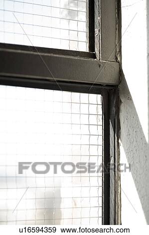 Stock Photo - Black and white industrial window detail. Fotosearch