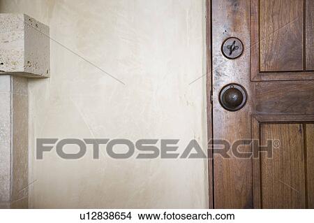Detail of a loack wooden door View Large Photo Image Picture - Detail of a loack wooden door. Fotosearch