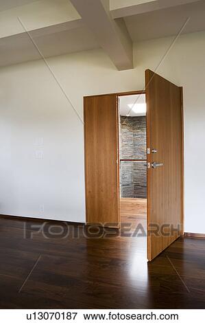 Hardwood floor and open door View Large Photo Image Stock Photo - Hardwood floor and open door. Fotosearch