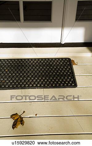 Leaf on Porch by Doormat View Large Photo Image Stock Image - Leaf on Porch by Doormat. Fotosearch