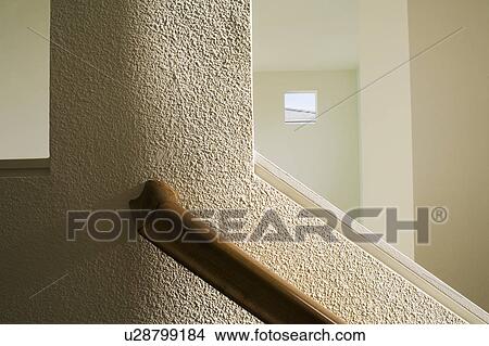 Wood Bannister on Textured White Wall View Large Photo Image Picture - Wood Bannister on Textured White Wall. Fotosearch