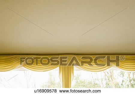 Yellow Valance and Curtains on Window View Large Photo Image Stock Photo - Yellow Valance and Curtains on Window. Fotosearch