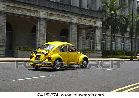 Car in street, Singapore View Large Photo Image Picture - Car in street, Singapore. Fotosearch