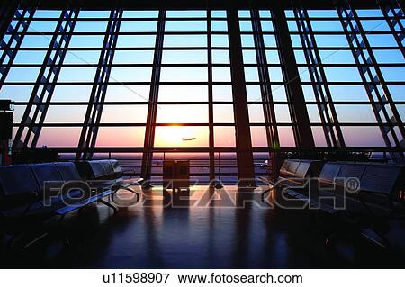 Plane taking off at sunset in Shanghai's Pudong International Airport View Large Photo Image Stock Photo - Plane taking off at sunset in Shanghai's Pudong International Airport. Fotosearch