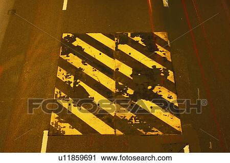 Stock Image - Road repair. Fotosearch