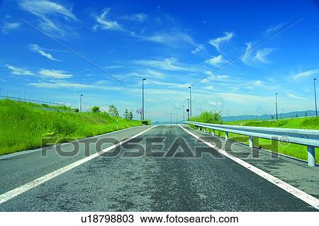 Single lane road in Hokkaido, Japan View Large Photo Image Stock Image - Single lane road in Hokkaido, Japan. Fotosearch