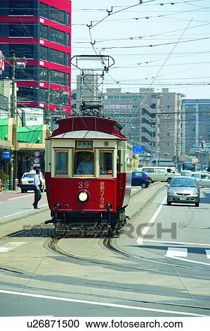 Tram in street, Hakodate, Hokkaido, Japan View Large Photo Image Stock Image - Tram in street, Hakodate, Hokkaido, Japan. Fotosearch