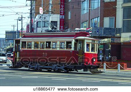 Tram in street, Hakodate, Hokkaido, Japan View Large Photo Image Stock Photo - Tram in street, Hakodate, Hokkaido, Japan. Fotosearch