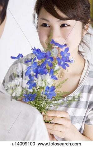 Stock Image - Flower and woman. Fotosearch