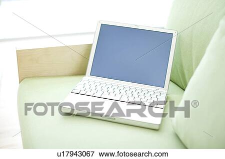 Laptop PC and sofa View Large Photo Image Stock Photo - Laptop PC and sofa. Fotosearch