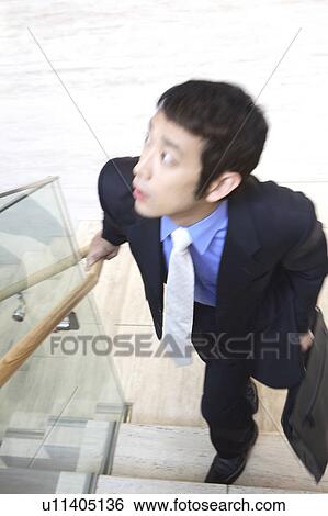 Businessmen moving View Large Photo Image Stock Photograph - Businessmen moving. Fotosearch