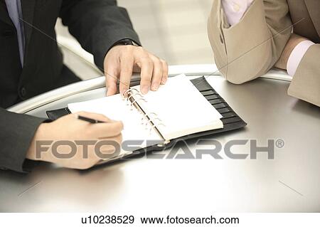 Stock Photo - Meeting scene. Fotosearch
