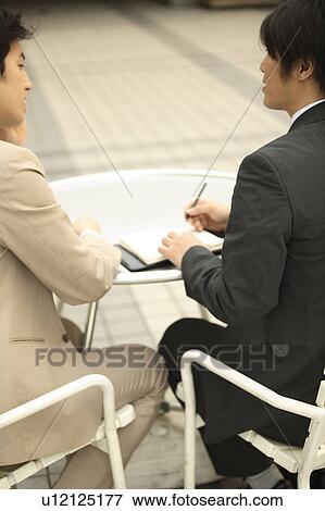 Stock Photo - Meeting scene. Fotosearch