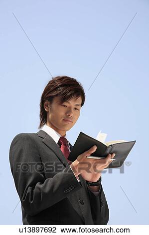 Stock Image - Office worker. Fotosearch