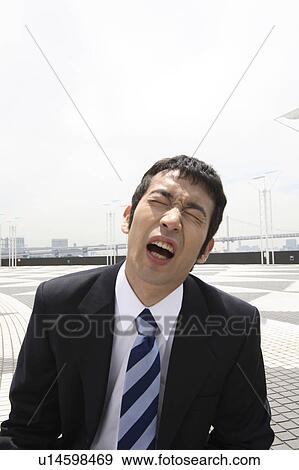 Tired businessman View Large Photo Image Stock Photo - Tired businessman. Fotosearch