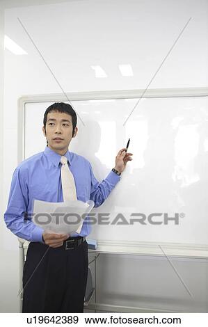 White board and businessman View Large Photo Image Stock Photo - White board and businessman. Fotosearch