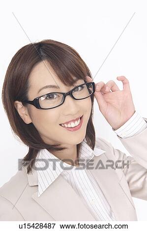 Stock Photo - Business lady wearing glasses. Fotosearch