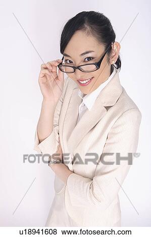 Business lady wearing glasses View Large Photo Image Stock Photo - Business lady wearing glasses. Fotosearch