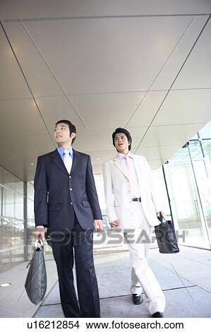 Businessmen moving View Large Photo Image Picture - Businessmen moving. Fotosearch