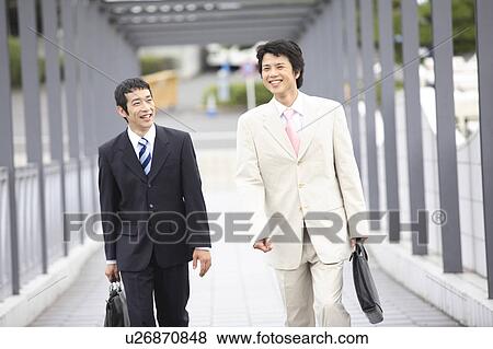 Stock Photo - Businessmen moving. Fotosearch