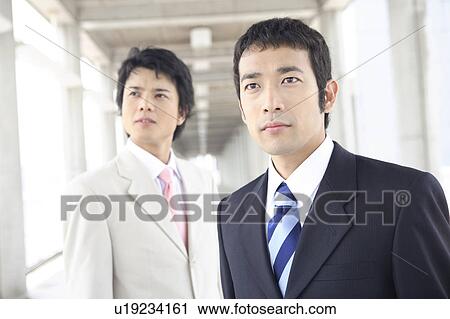 Stock Image - Portrait of businessmen. Fotosearch
