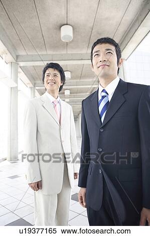 Stock Photography - Portrait of businessmen. Fotosearch
