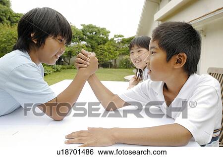 Arm wrestling View Large Photo Image Stock Photograph - Arm wrestling. Fotosearch