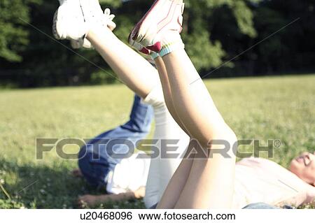 Stock Photograph - Brother who plays at the park. Fotosearch